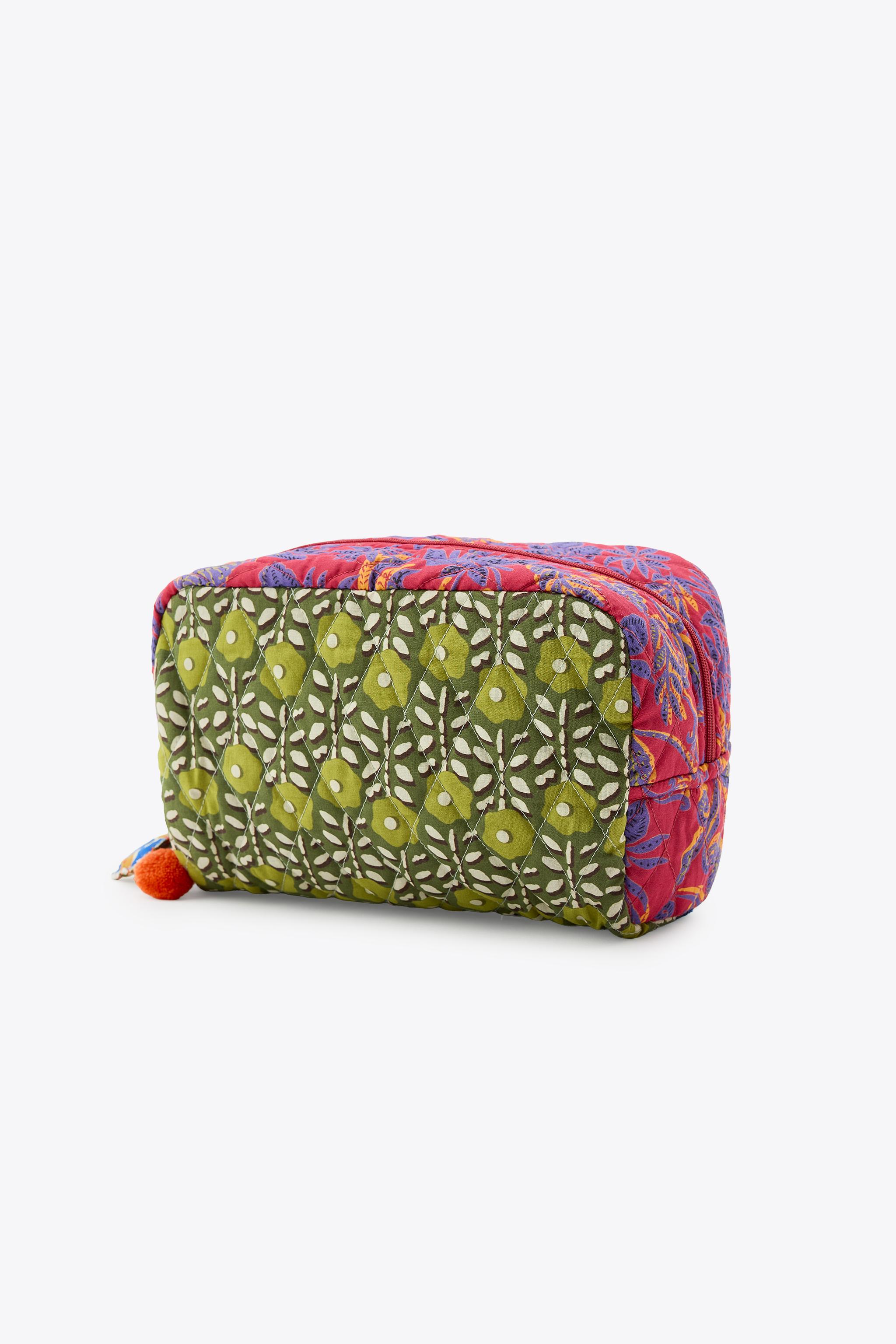 CHARM PRINT TOILETRY BAG